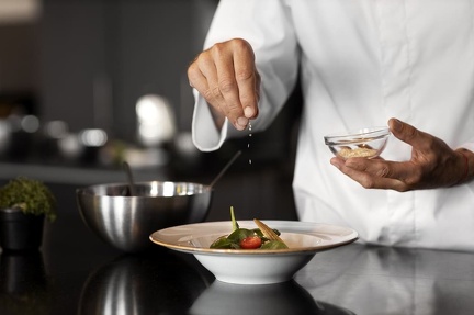 professional-chef-preparing-food-kitchen
